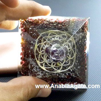 Garnet Orgone Pyramid With Metal Flower Of Life And Amethyst Point