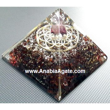 Garnet Orgone Pyramid With Metal Flower Of Life And Amethyst Point